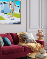 Stylish and sun-drenched: A chic woman in a floppy hat strides towards her sun-drenched Palm Springs home with a standout pink door