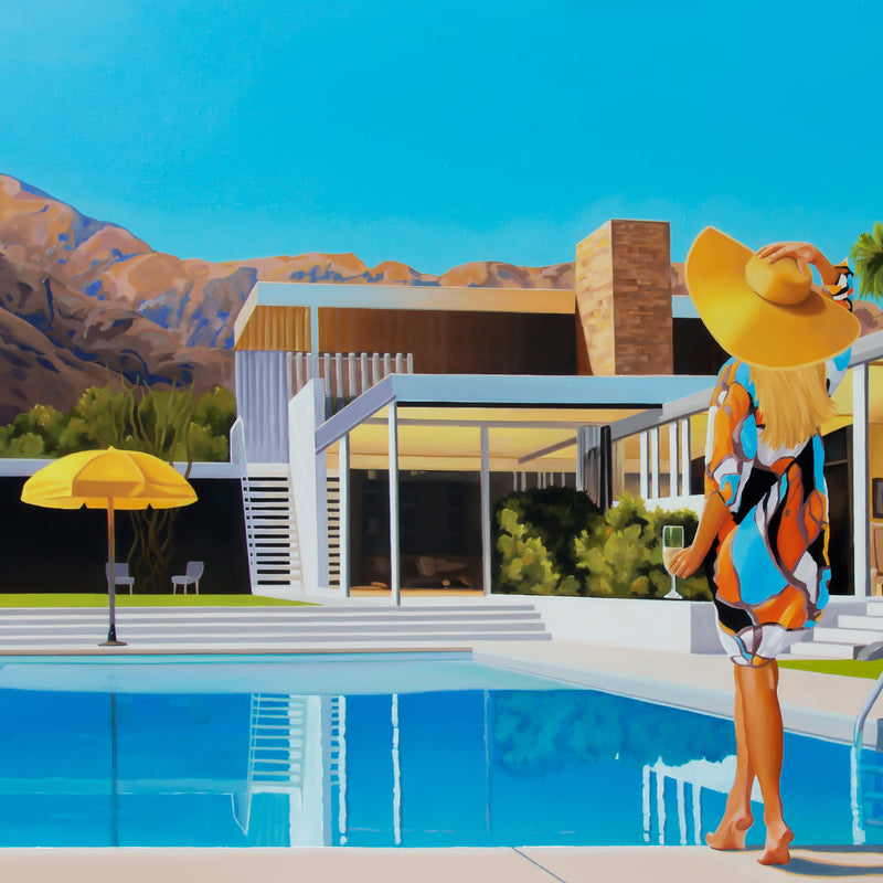 A stunning piece of art captures a perfect summer day, with a woman relaxing poolside in a floppy hat and dress, and the Kaufmann house and yellow umbrella completing the picture